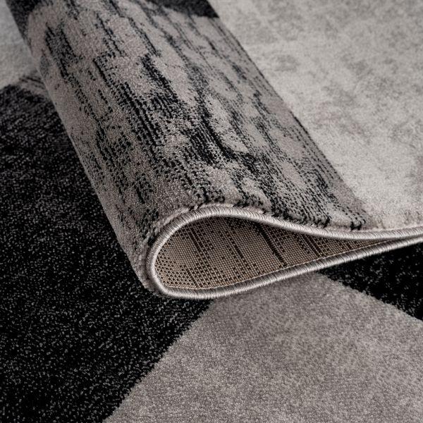 Tapis gris à carreaux géométriques Montage