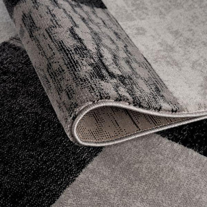 Tapis gris à carreaux géométriques Montage