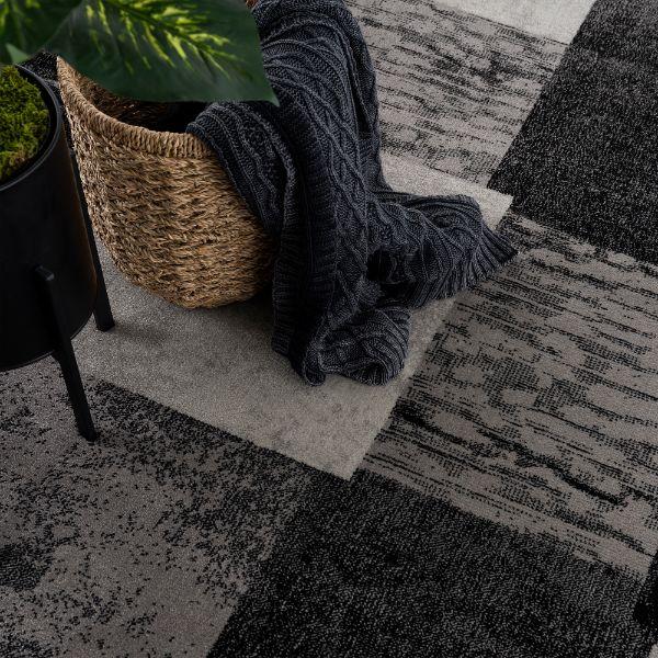 Tapis gris à carreaux géométriques Montage