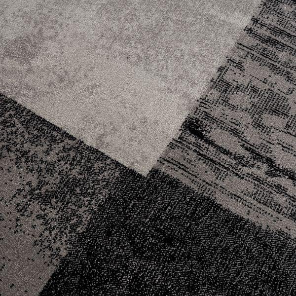 Tapis gris à carreaux géométriques Montage