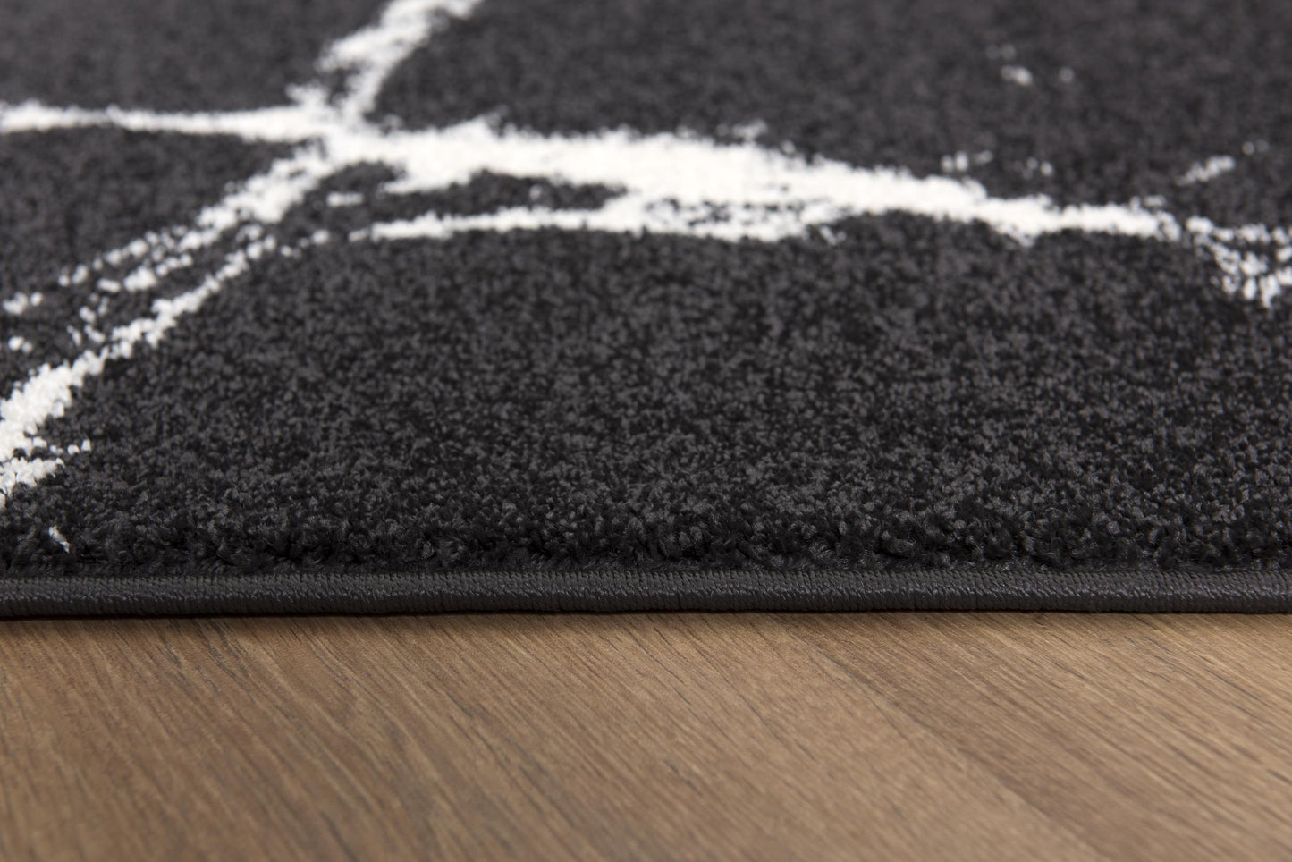 Tapis moderne en marbre noir Nova