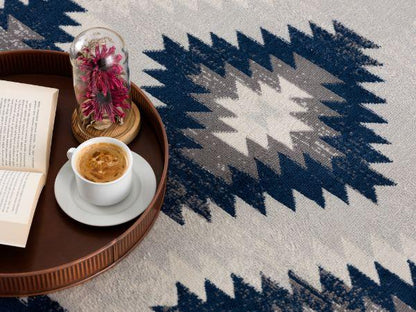 Tapis bleu contemporain Savannah Boho